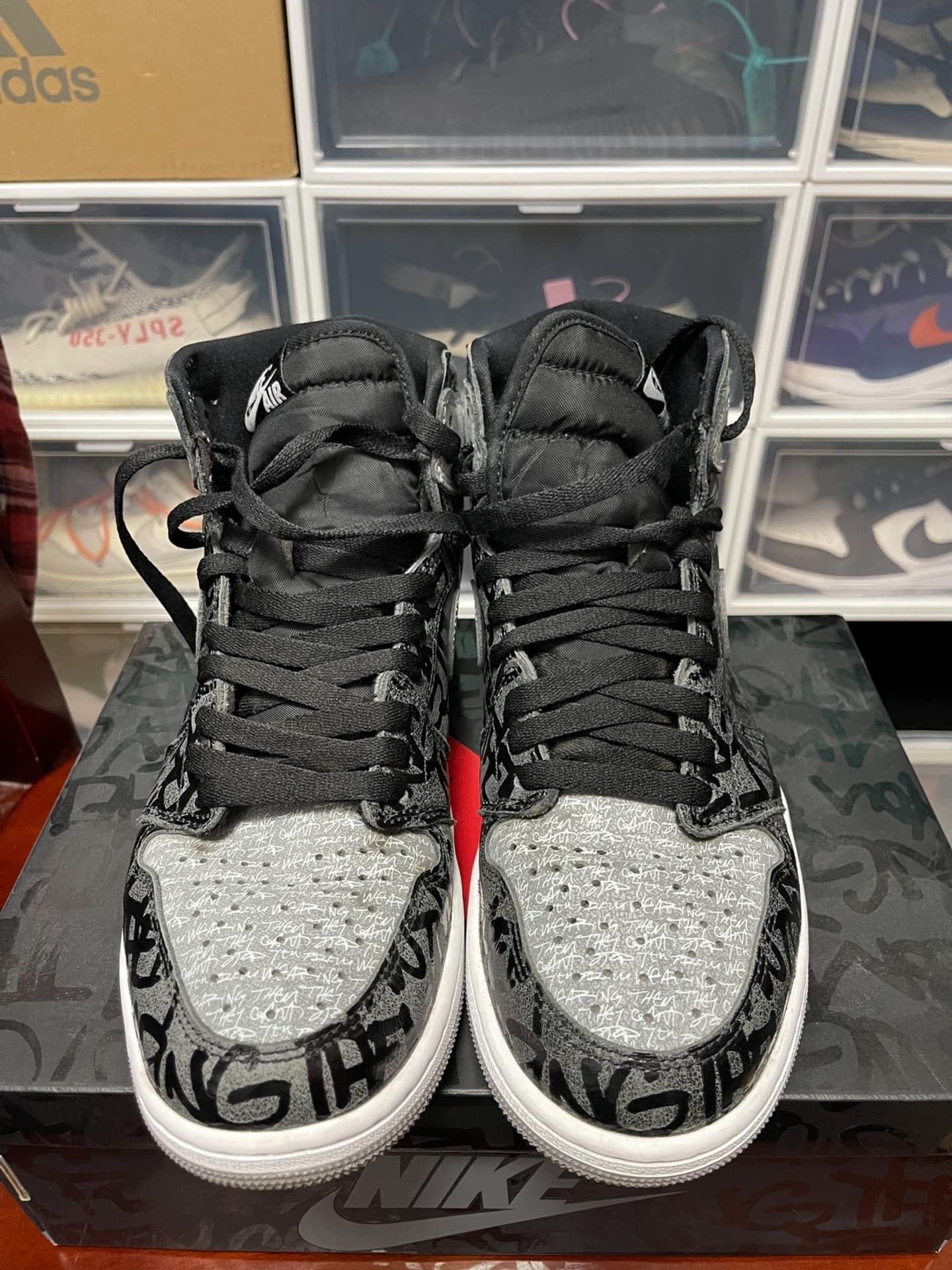Jordan Air Jordan 1 retro high og "rebellionaire" - фото покупателя Борис